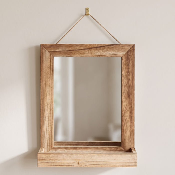 Fernley rustic wooden mirror with shelf hanging from a brass hook