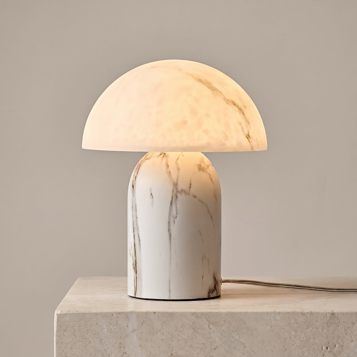 Aurisa marble-effect mushroom table lamp, lit