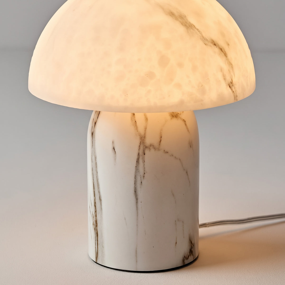 Close-up of the Aurisa veined marble-effect shade