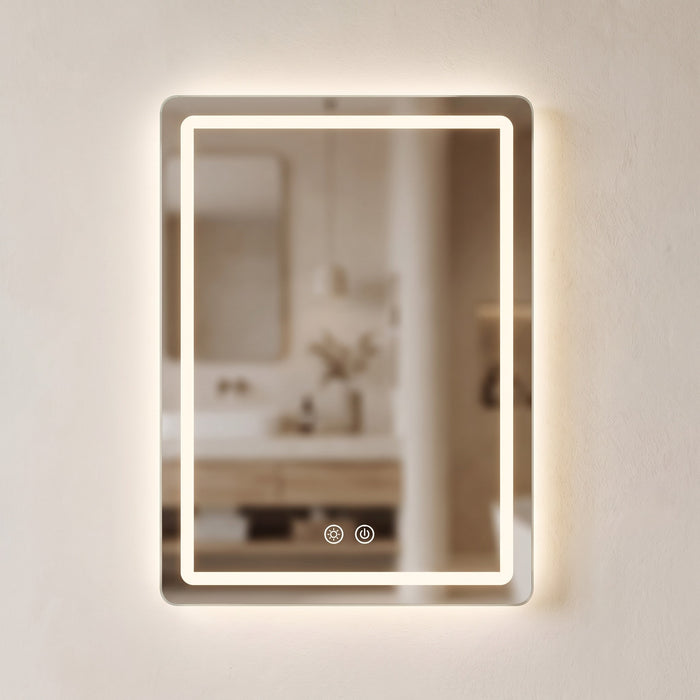 Luvelle LED bathroom mirror with front light band and backlight on a warm plaster wall