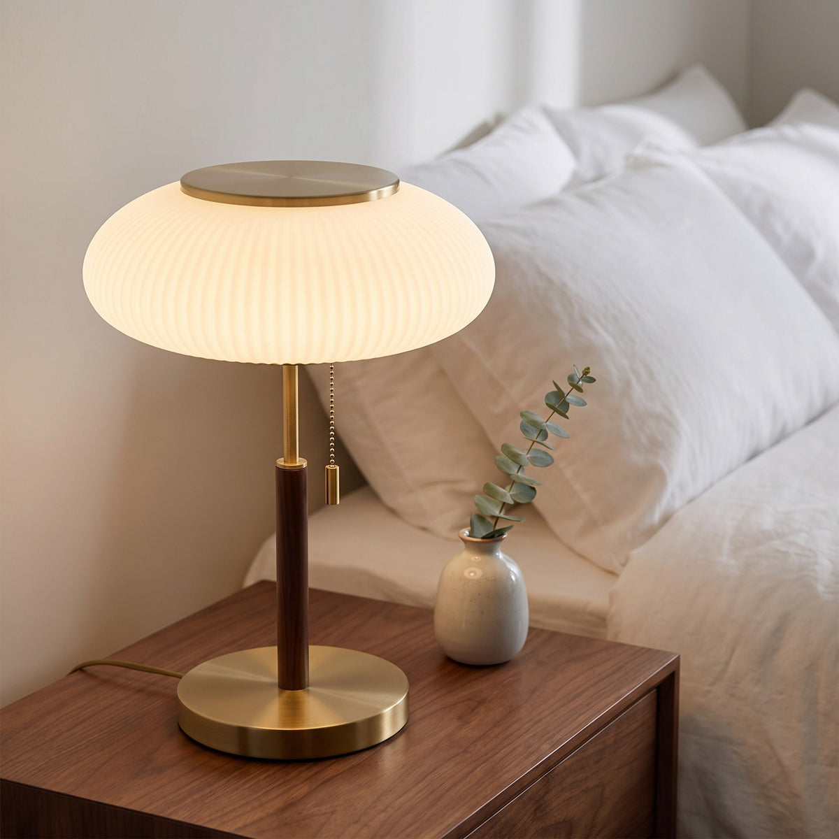 Maelis ribbed glass lamp on a walnut bedside table