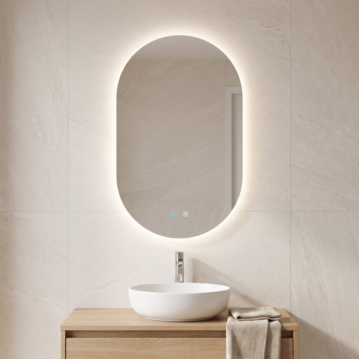 Ovelune oval LED mirror in a bright bathroom above an oak vanity