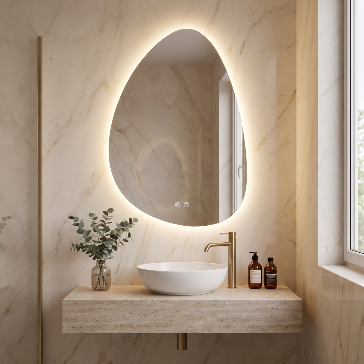 Pellora pebble LED mirror above a vessel basin on a stone vanity