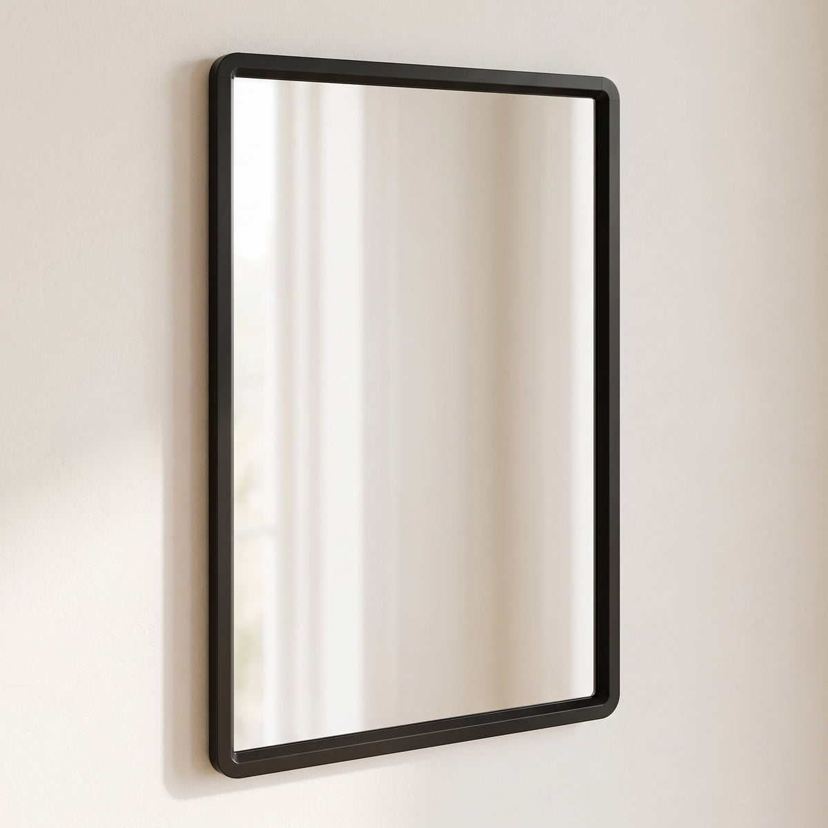 Sabelle black rectangular mirror, angled view of the slim aluminium frame